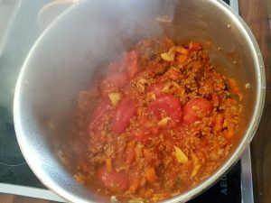 Bolognese-Tomaten kochen
